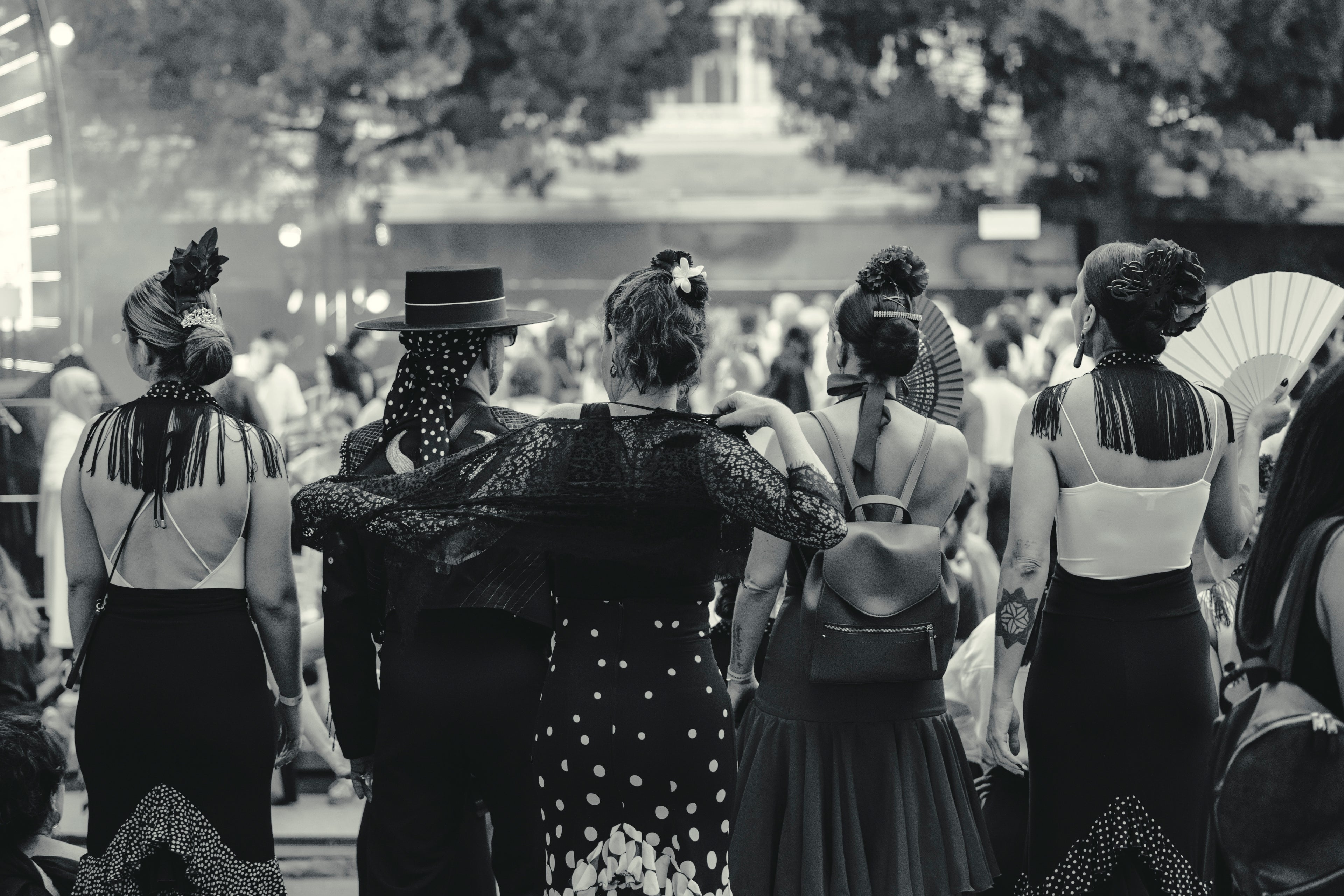 Dancers in traditional Spanish dress at music event